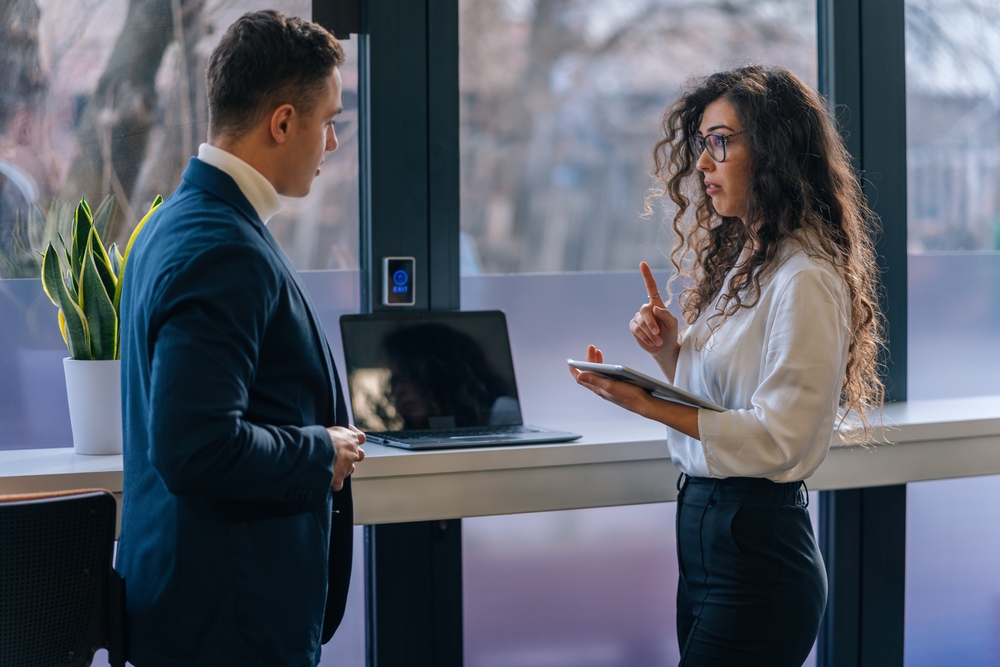 a supervisor having a calm conversation after making a wrong hire decision