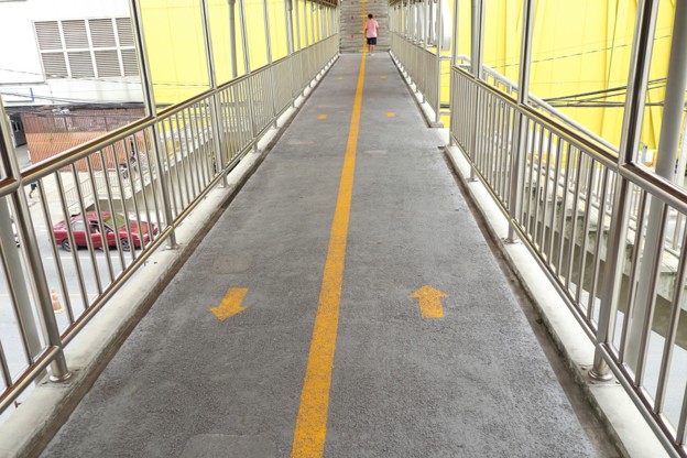 a long corridor with no resting bench