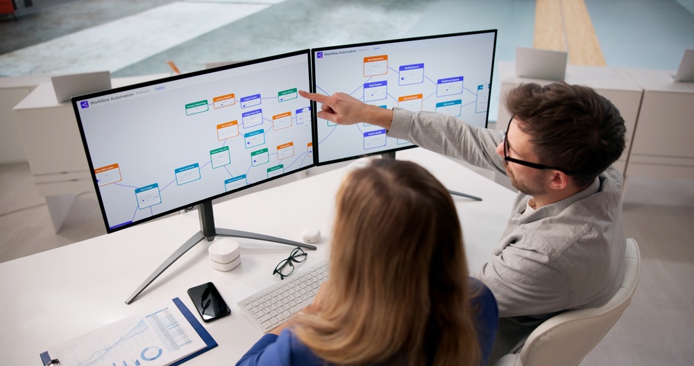 a team using AI in operations to review real-time business data and improve operational decision-making.