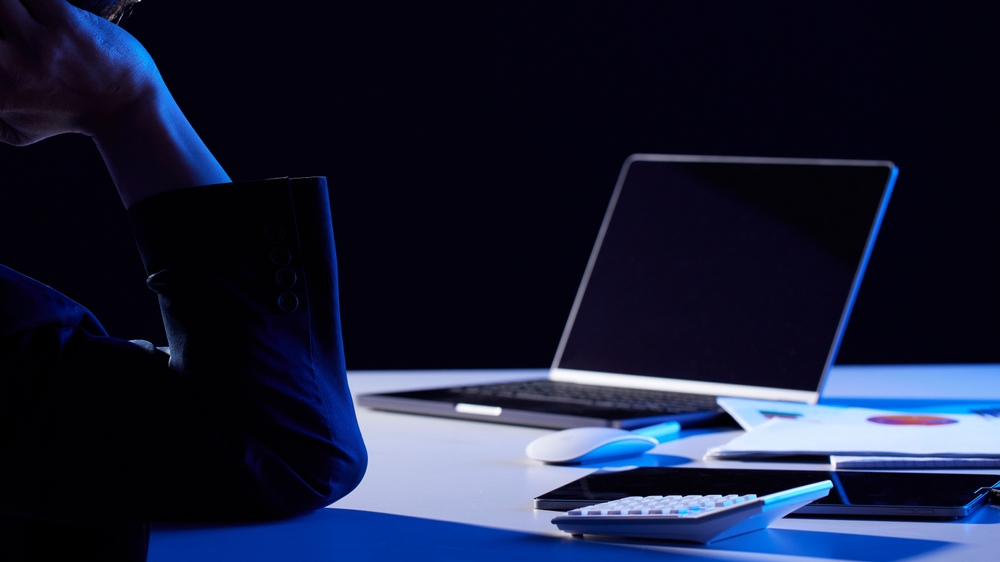 Business founder working methodically late at night building long-term strategy